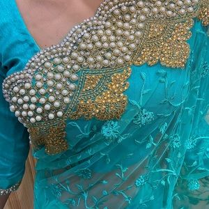 Turquoise pearl saree